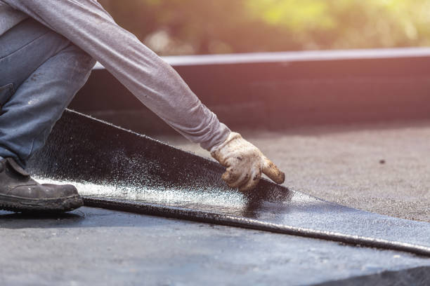 Professional Basement Waterproofing technician working in Appleton, NY
